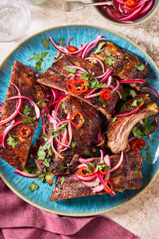 Sheet Pan Shawarma Style Ribs with Quick Pickled Onions, Miso Butter Sweet Potatoes, and Everyday Green Salad